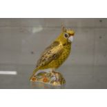 A Crown Derby model of a Citron Cockatoo.