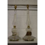 A pair of cut glass lamps.
