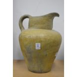 A large pottery jug.