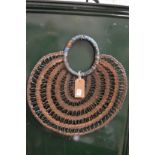 An African wicker necklace.