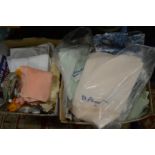 Two boxes of household linen.
