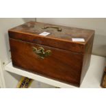 A Georgian mahogany tea caddy.