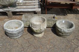 A pair of garden pots, a pedestal pot and a rectangular planter.