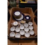 A quantity of blue and gilt decorated teaware.