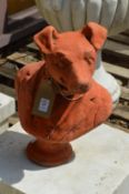 A terracotta garden ornament modelled as a bust of a dog.