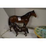 Two Beswick horses.