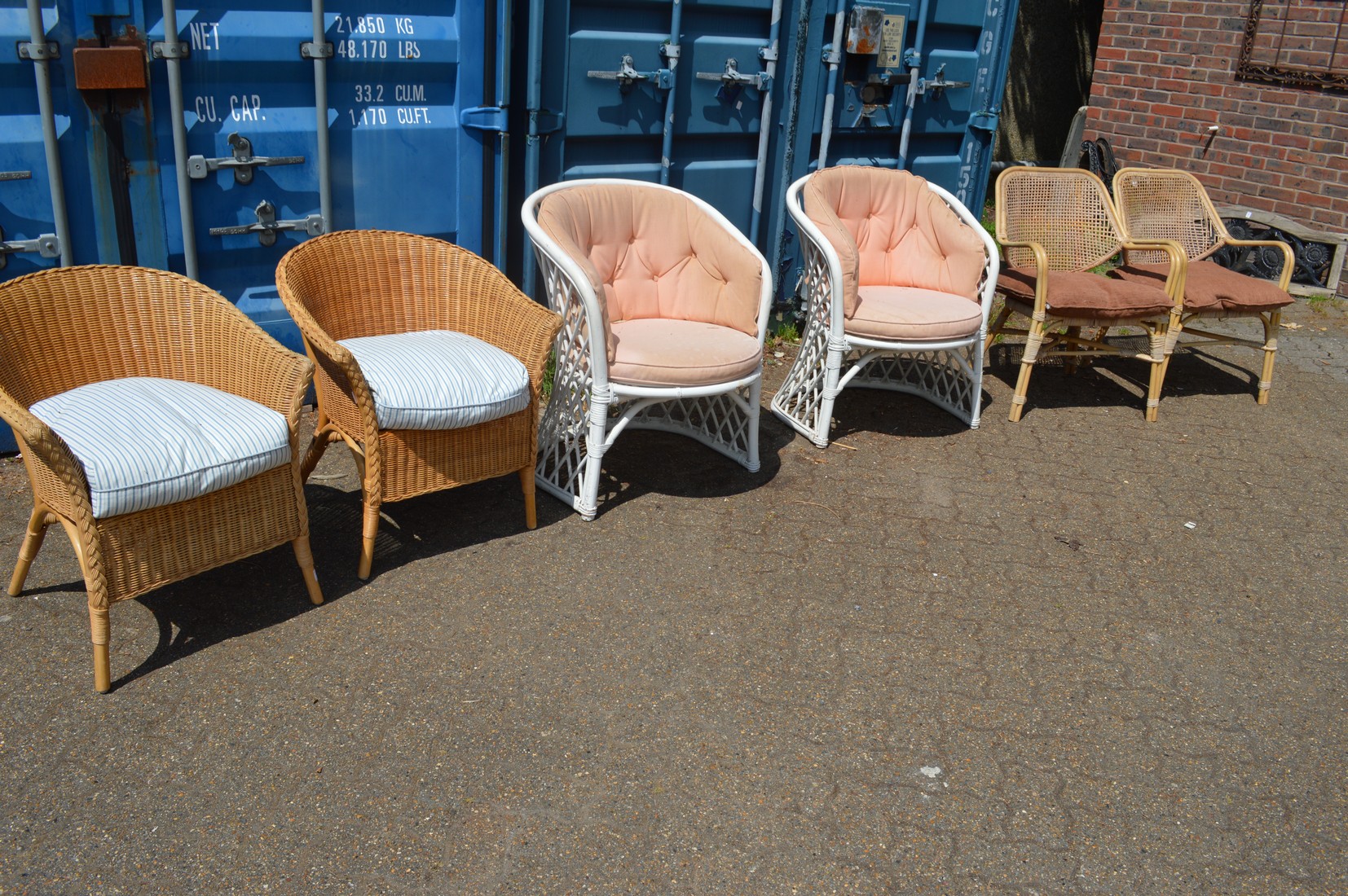 Three pairs of wicker and bamboo conservatory armchairs.