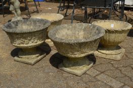 Two pairs of pedestal garden planters.