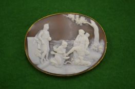 A large Victorian oval cameo brooch.