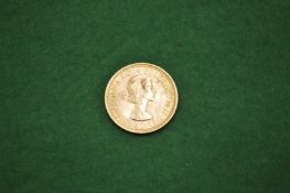 An Elizabeth II gold sovereign dated 1958.