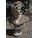 A composite garden ornament modelled as the bust of a classical Roman man.