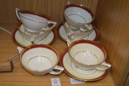 Minton soup bowls and stands.