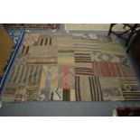 An unusual patchwork style African rug 190cm x 140cm.