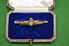 A 9ct gold RAF brooch.