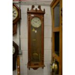 A Vienna style regulator wall clock.