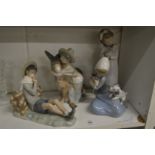 Three Lladro figures and a Neo figure.