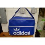 An Adidas, Peter Black sports holdall.