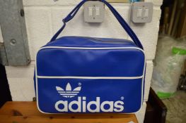 An Adidas, Peter Black sports holdall.