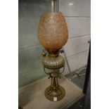 A good brass and glass oil lamp.