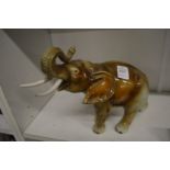 Porcelain model of a bull elephant.
