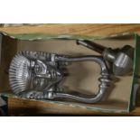 An Egyptian revival chrome plated door knocker and similar door knob.