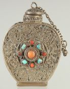 A SMALL FILIGREE SNUFF BOTTLE WITH INSET CORAL AND TURQUOISE STONES, 5cm high.