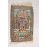 A SMALL 19TH CENTURY PICTORIAL TABRIZ RUG, with image of a mosque, 84cm x 54cm.