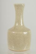 A SMALL CHINESE CRACKLE GLAZE VASE, 14.5cm high.