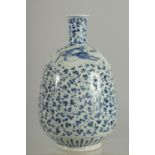 A JAPANESE BLUE AND WHITE PORCELAIN BOTTLE VASE, with deer and scrolling foliate decoration, 21cm