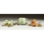 A CARVED JADE BUNCH OF GRAPES, together with another similar hardstone group and a large carved jade