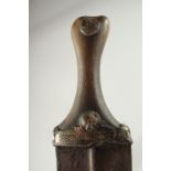 A 19TH CENTURY ARAB OMANI HORN HILTED JAMBIYA DAGGER, 30.5cm long.