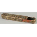 A 19TH CENTURY MUGHAL KALAMDAN PEN BOX, with gilded floral decoration, 24cm long.