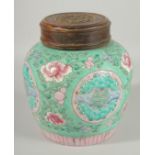 A CHINESE REPUBLIC PERIOD POLYCHROME FAMILLE ROSE PORCELAIN GINGER JAR AND COVER, with longevity
