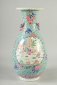 A LARGE CHINESE TURQUOISE GROUND FAMILLE ROSE PORCELAIN VASE, the neck with moulded chilong, the