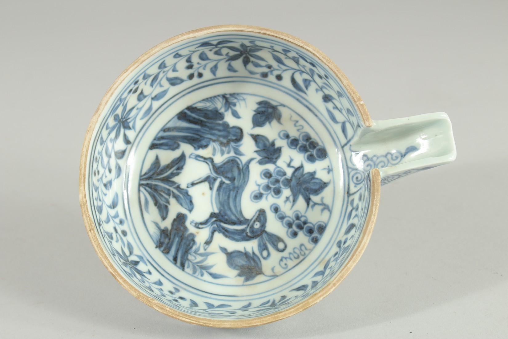 A CHINESE BLUE AND WHITE PORCELAIN OIL CUP, painted with a rabbit, 13cm diameter (excluding spout). - Image 3 of 4