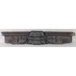 A FINELY CARVED 18TH-19TH CENTURY INDIAN WOODEN DOOR PANEL, 111cm x 20cm.