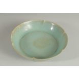 A CHINESE CELADON GLAZE PETAL-FORM BOWL, 14.5cm diameter.