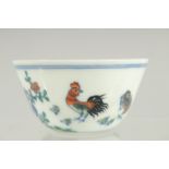 A CHINESE DOUCAI PORCELAIN TEA CUP, 8cm diameter.