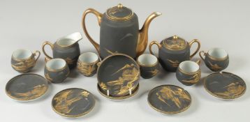 A GOOD JAPANESE BLACK AND GILT PORCELAIN TEA SET, comprising teapot, jug, sugar bowl, and six cups