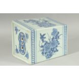AN UNUSUAL LARGE CHINESE BLUE AND WHITE PORCELAIN PILLOW, painted with panels of flora and fauna,