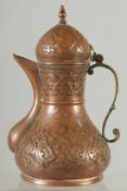 A 19TH CENTURY OTTOMAN TURKISH COPPER COFFEE POT, 18cm high.