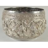 A FINE LARGE 19TH CENTURY BURMESE SILVER BOWL, with repousse decoration, 22cm diameter. weight