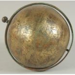 A RARE 19TH-20TH CENTURY INDIAN ENGRAVED BRASS GLOBE, 12.5cm.