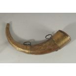 A BRASS MOUNTED BOVINE HORN, 28cm long.