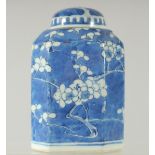 A CHINESE BLUE AND WHITE PORCELAIN OCTAGONAL JAR AND COVER, painted with prunus blossom, base with