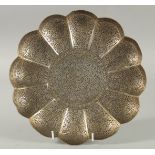 A FINE EARLY 19TH CENTURY NORTH INDIAN KASHMIRI PARCEL GILT SILVER FOOTED DISH, 26.5cm diameter.
