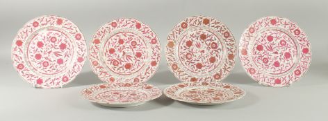 A SET OF SIX 19TH CENTURY PERSIAN PLATES, with floral decoration and mark to base, 21.5cm diameter.