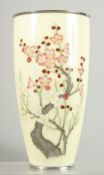 A JAPANESE YELLOW GROUND CLOISONNE VASE, depicting a prunus tree, 24.5cm high.