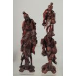 FOUR CHINESE CARVED WOOD FIGURES, (4).