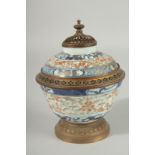 A CHINESE BLUE AND WHITE / FAMILLE ROSE PORCELAIN TEA CUP AND COVER, converted to a lamp, Xuantong